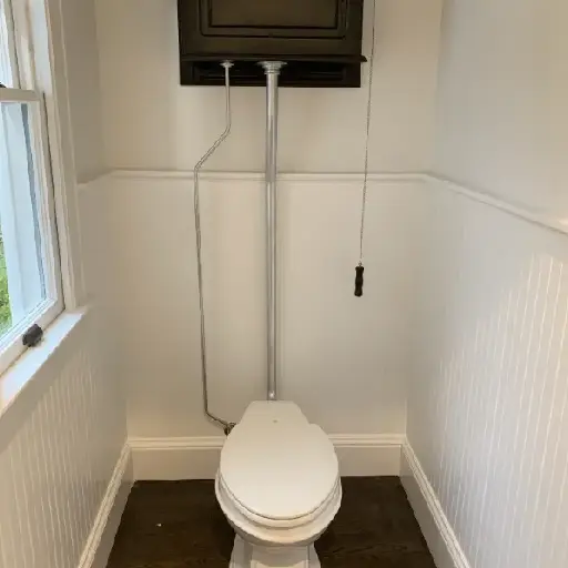 white high-tank toilet